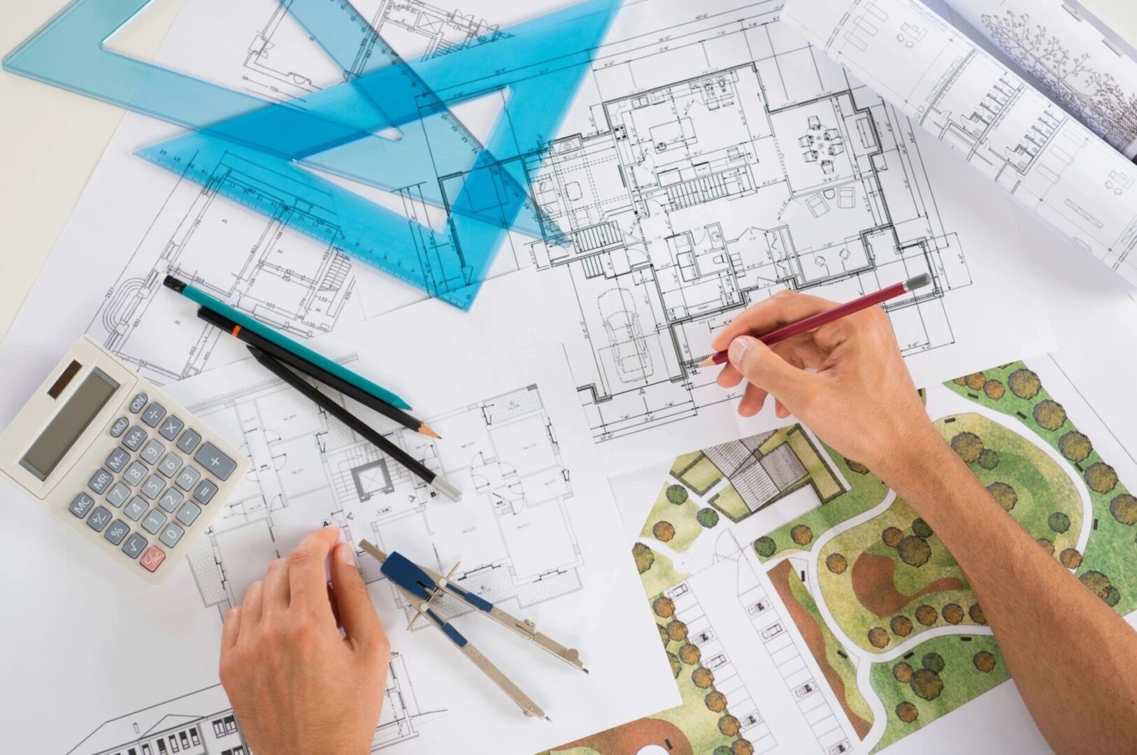 Architect Designing the Blueprint of a Commercial Building